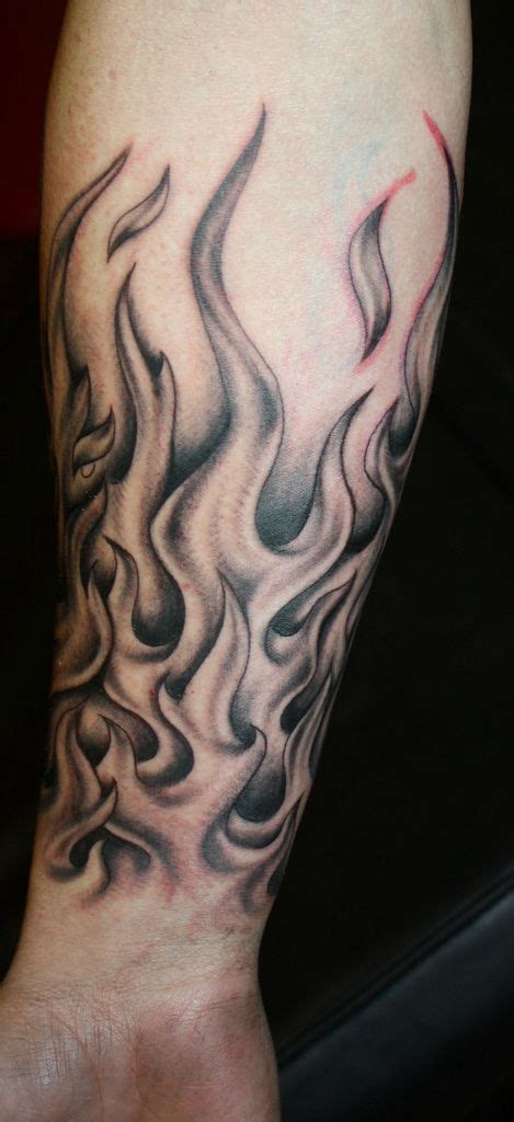 heart and flame tattoos|flame forearm tattoo designs.